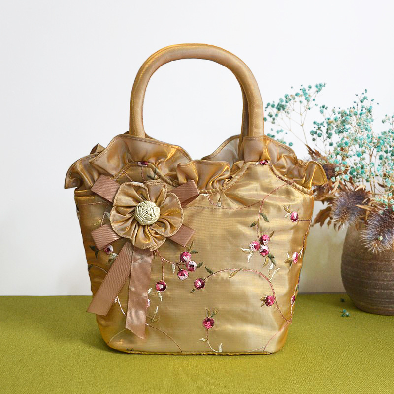 出口布艺刺绣手提包蕾丝花边女包女士包包日系化妆包妈妈包