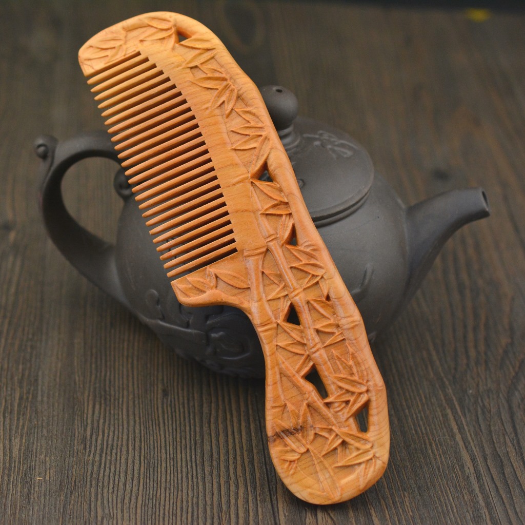 双面雕刻桃木梳保健按摩木制头发梳子抗静电桃木礼品梳子