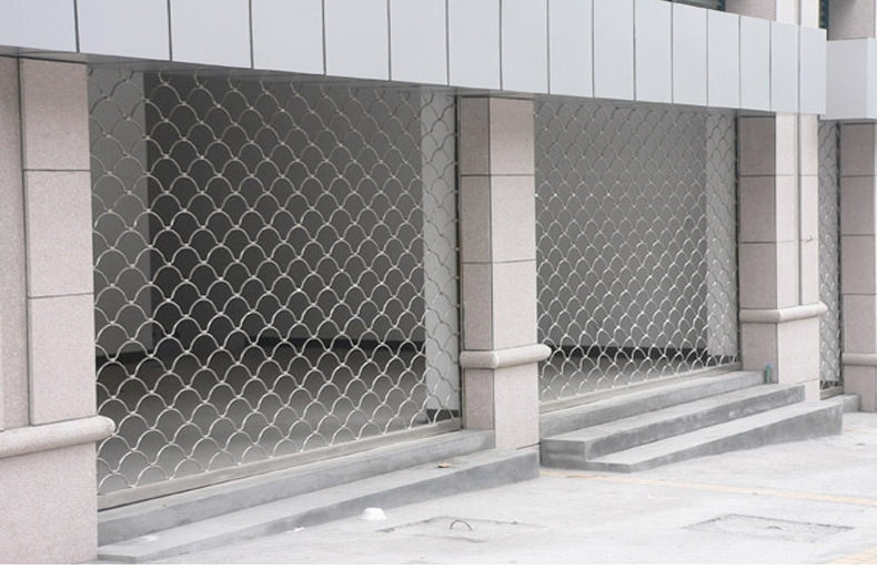 厂家批发供应白钢网格卷帘门 电动网型卷帘门 金属电动卷帘门安装