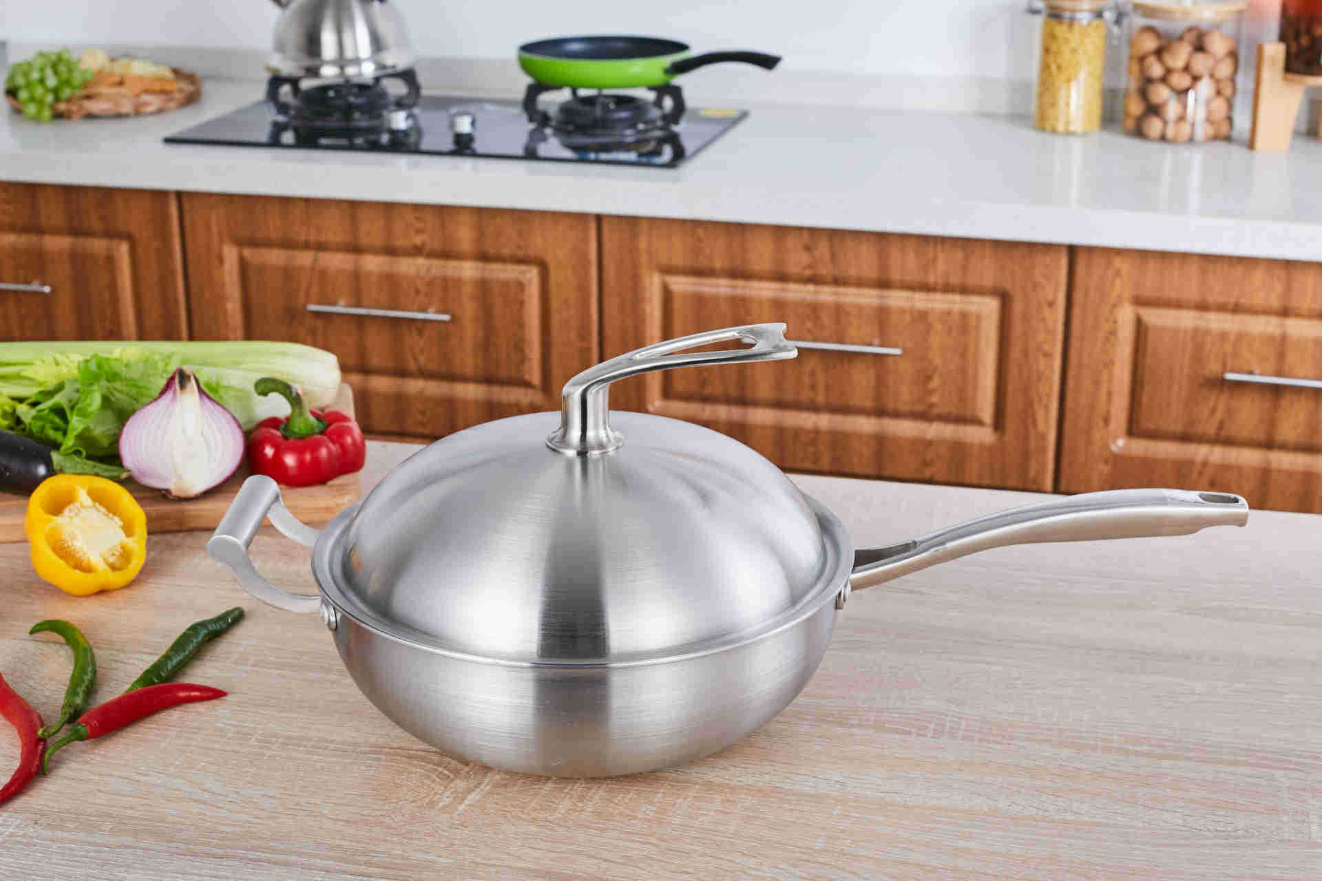 不锈钢三层钢无烟无涂层长柄炒锅蒸锅皇后锅