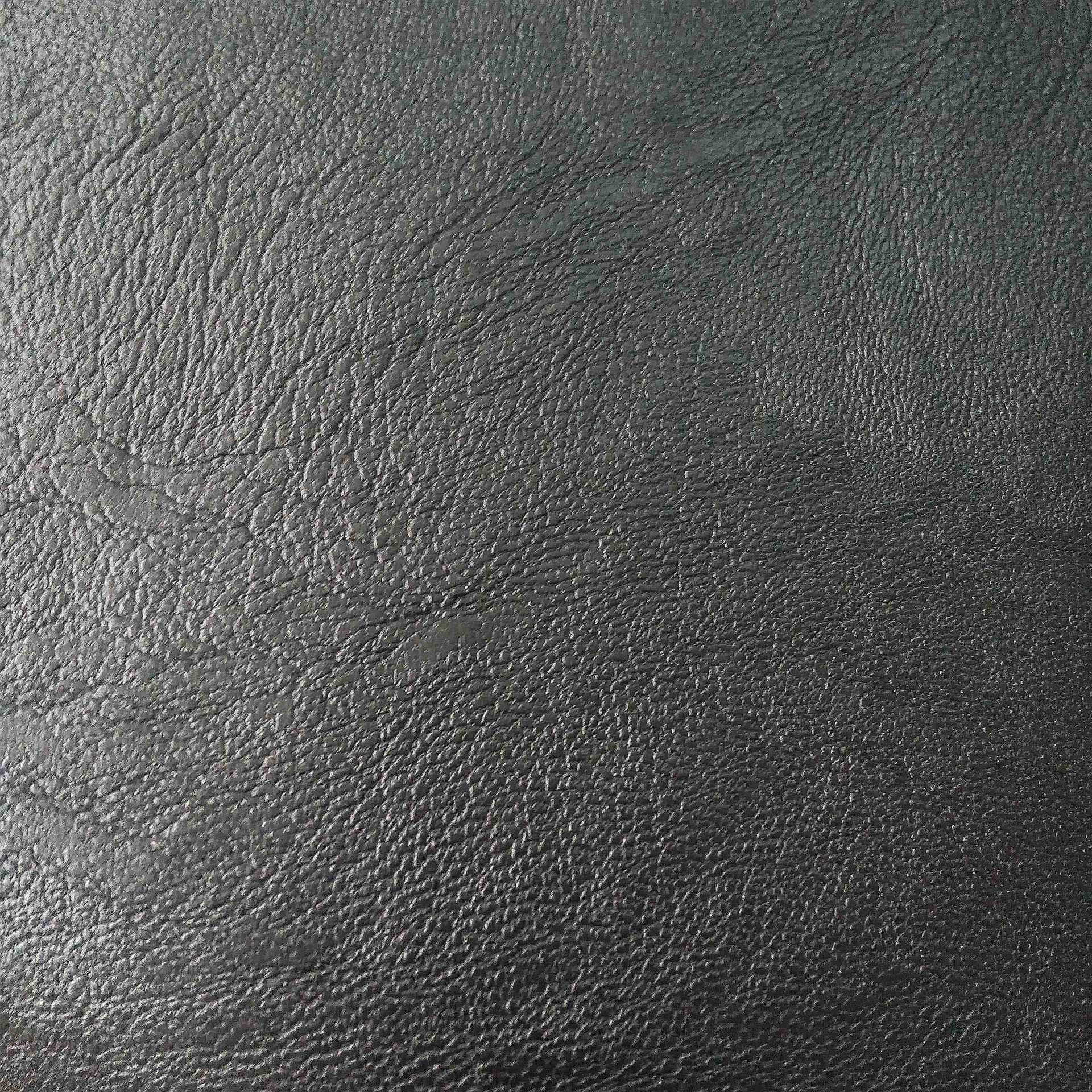 厂家供应 pu人造革 粗犷纹路 粘胶底 时尚夹克外套 pu皮面料