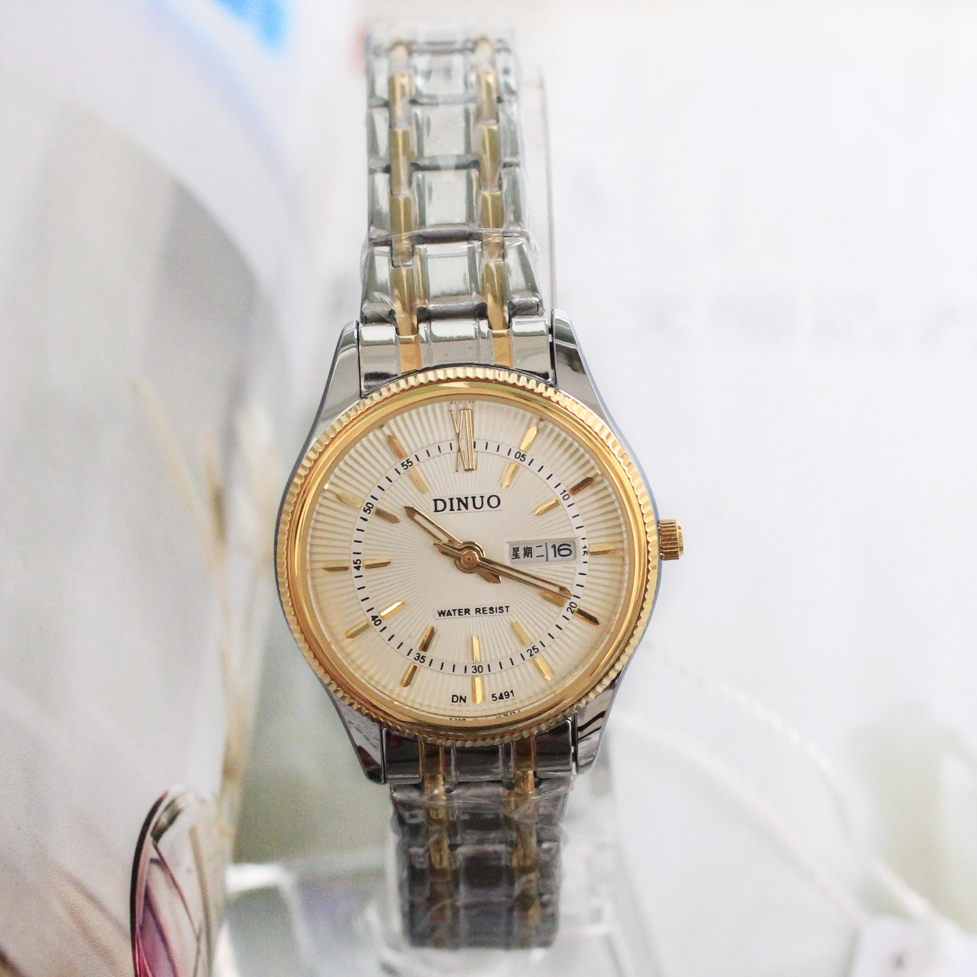 正品谛诺日历防水男女表韩版钢带商务那女石英表情侣手表对表直销