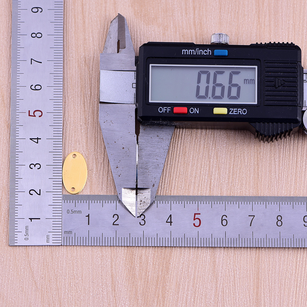 16*9mm电镀多色黄铜双孔实心椭圆光面铜片耳环吊坠箱包饰品配件