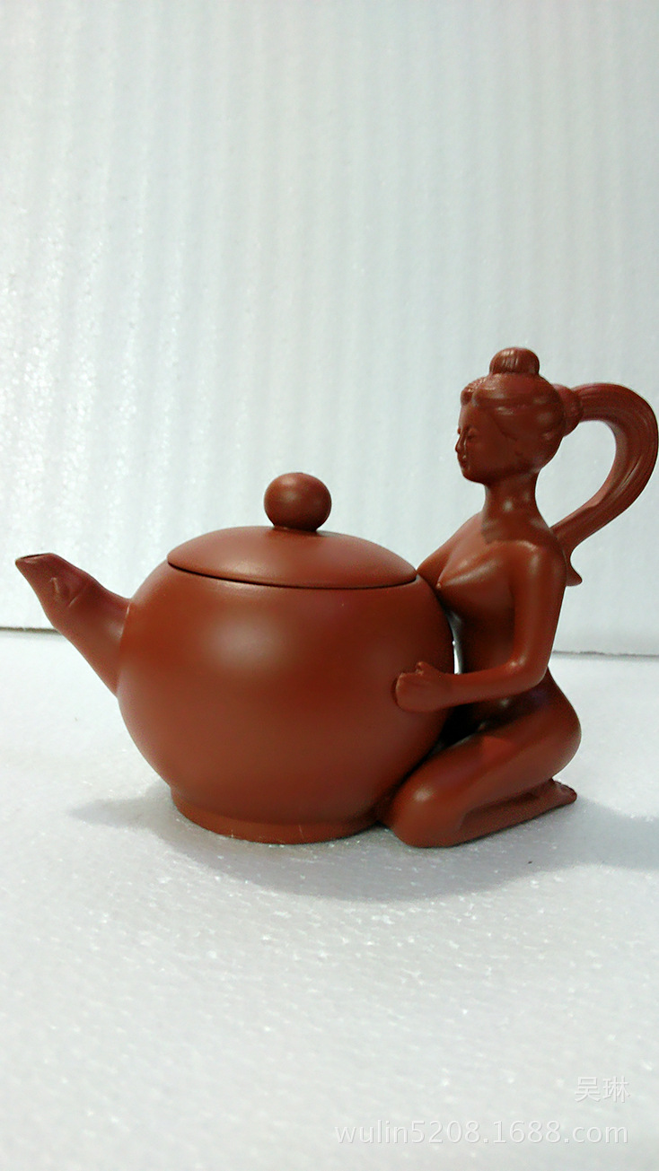 首页 茶具 茶壶系列 提梁茶壶 >紫砂茶壶陶瓷朱泥壶提梁壶泡茶 特色