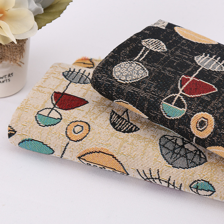 厂家直销涤棉平纹色织提花布 民族风服装鞋材箱包提花面料现货