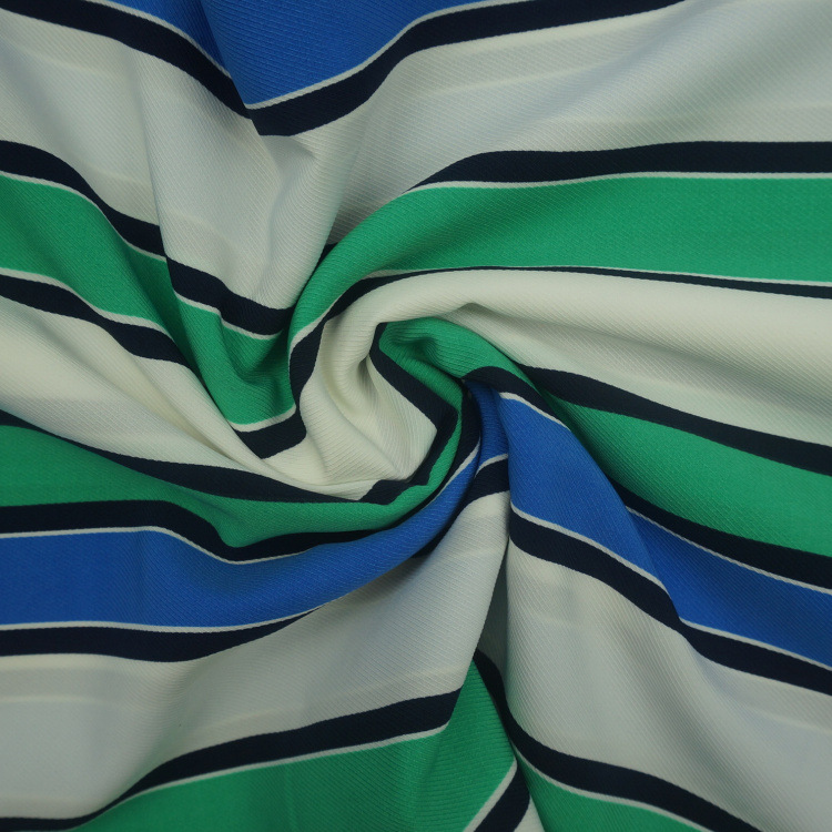 2016年时装新款双面斜纹印花面料 poly印花女装面料蓬.