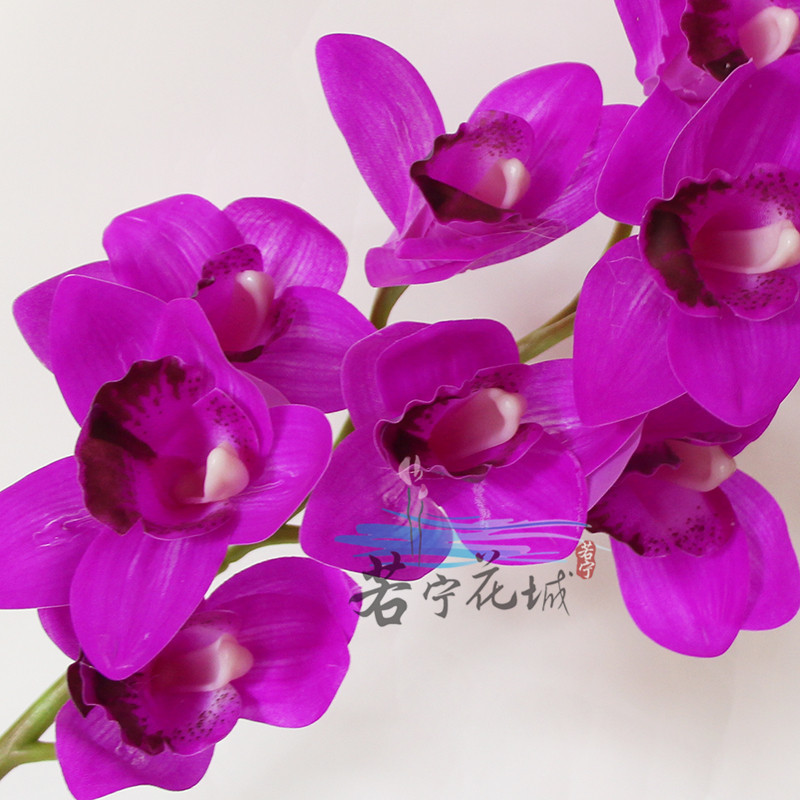 仿真蕙兰高仿真花塑料假花人造绢花12头胶片蕙兰花东亚兰大枝热卖
