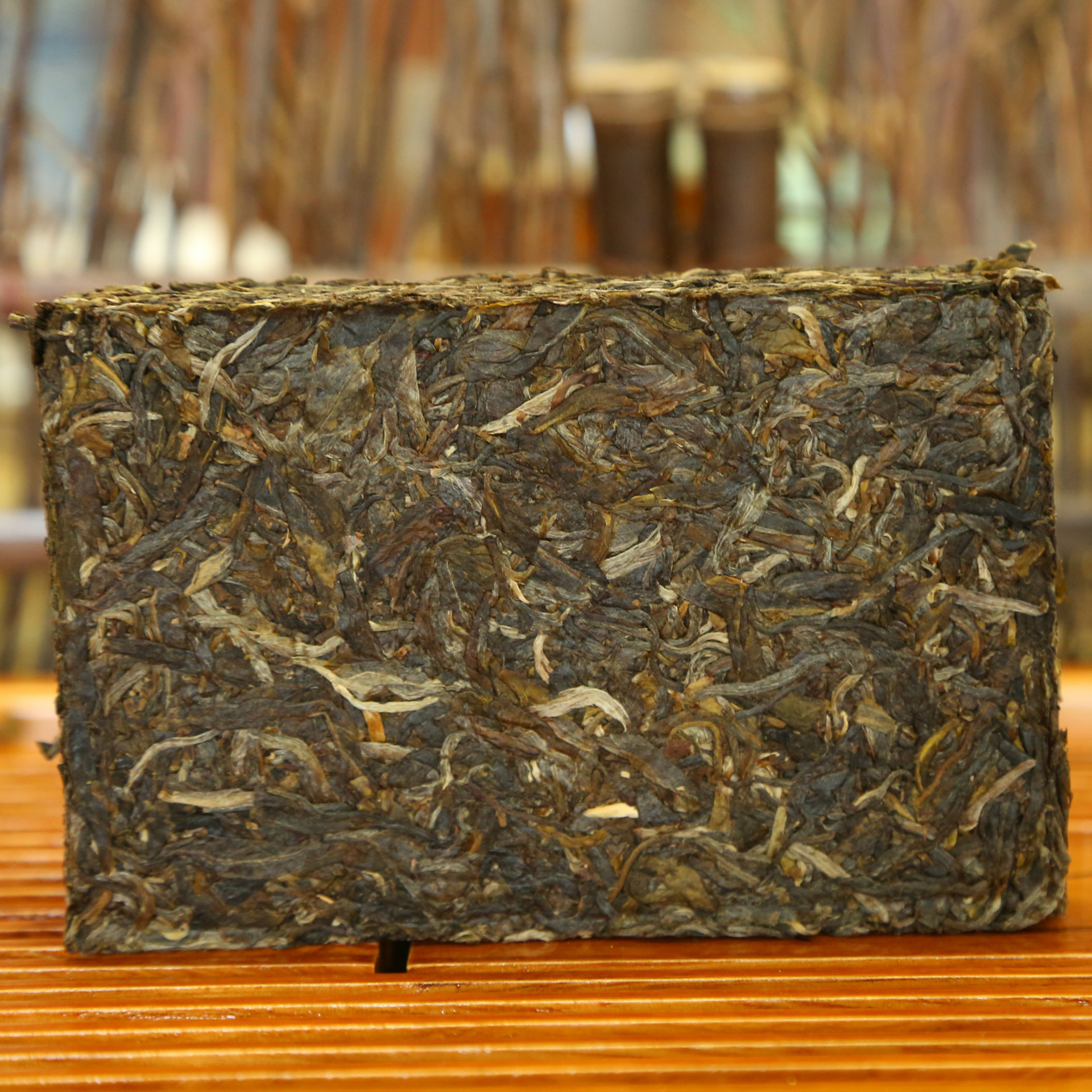 2016年云南百年乔木普洱茶生茶饼古树纯料250g散装深山古树早春茶