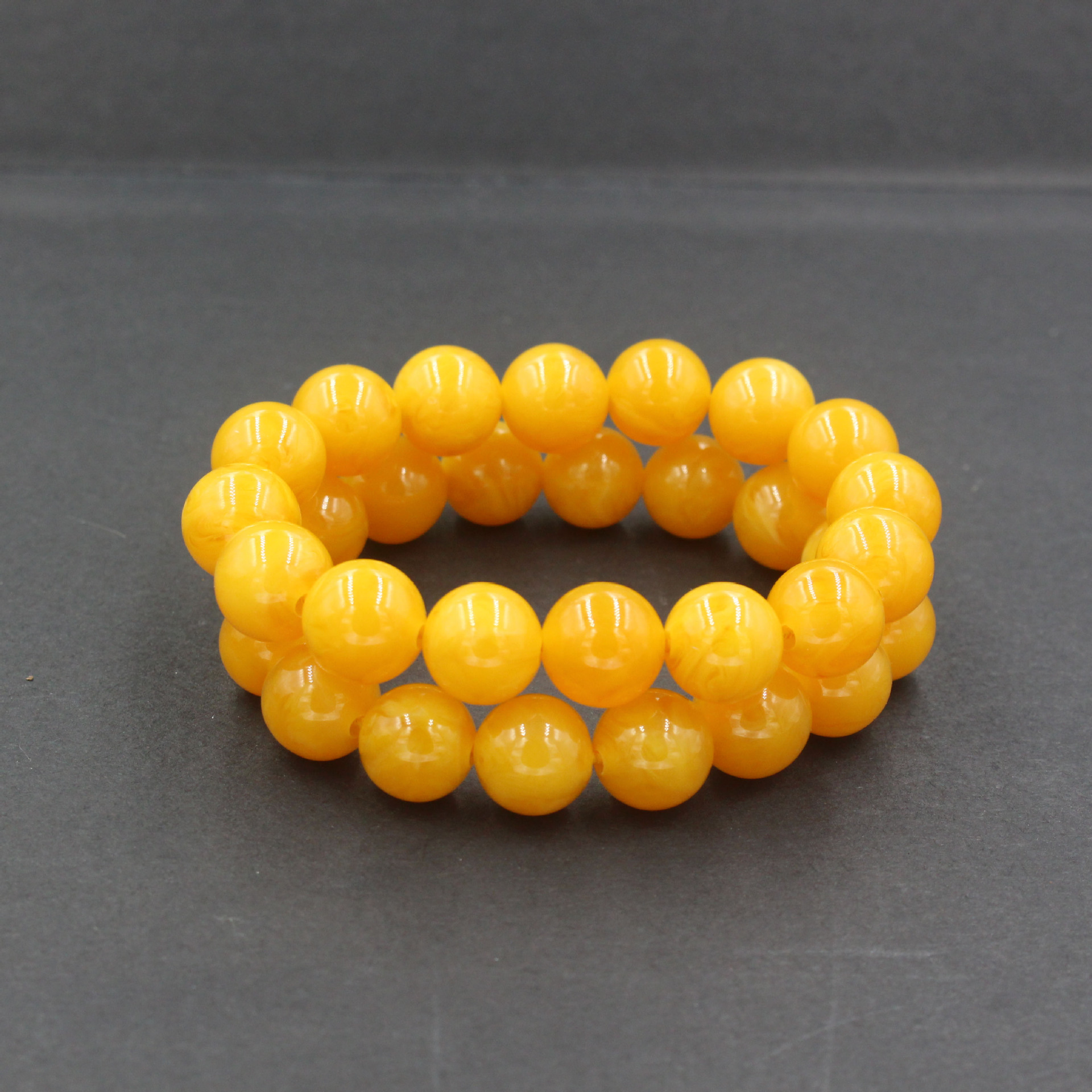 跑江湖人工合成老蜜蜡圆珠 手链鸡油黄蜜蜡琥珀手串厂家义乌批发