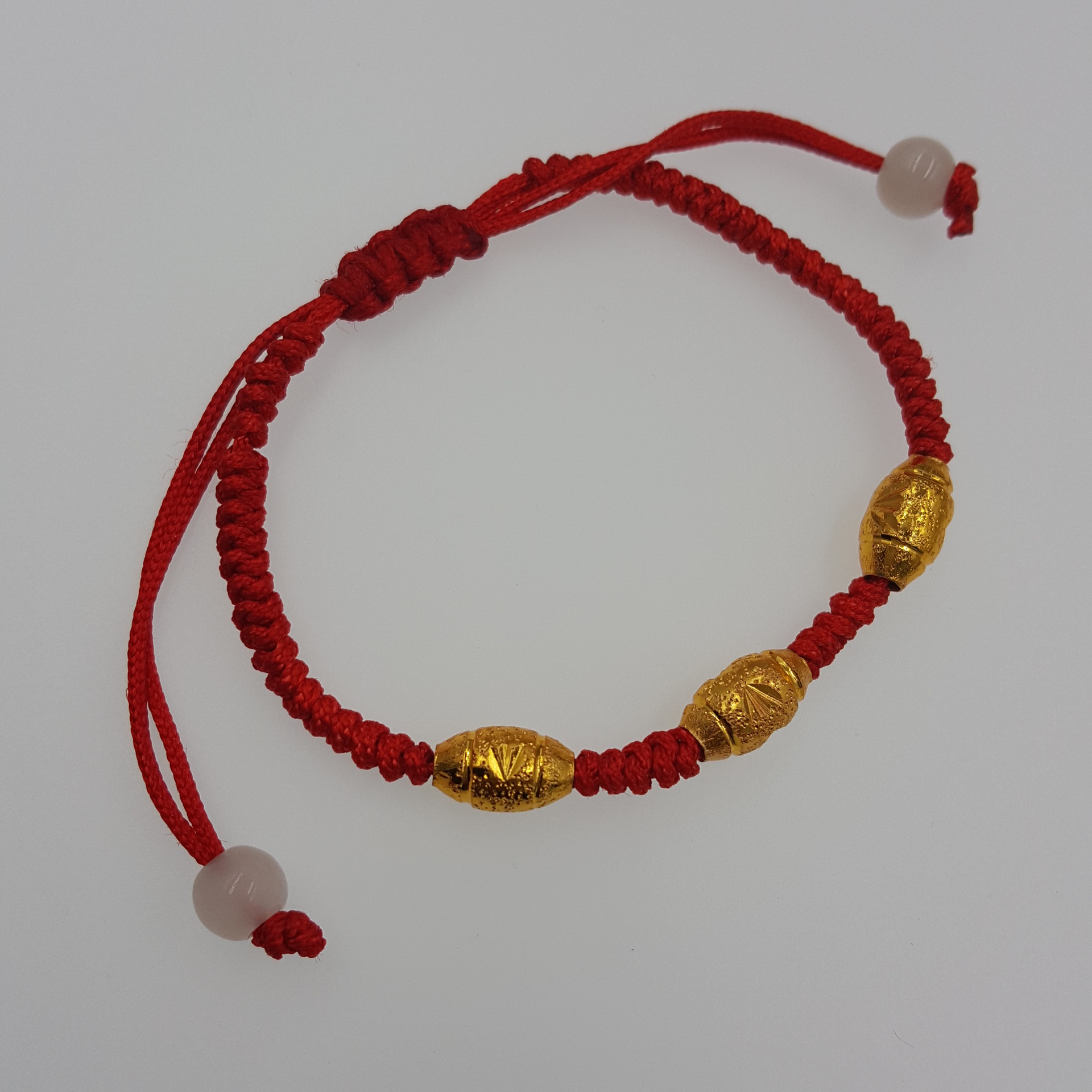 地摊本命年红绳手链转运金珠保色手工编手链2元店地摊货爆款批发