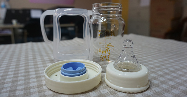 正品批发爱得利带保护套宽口晶钻玻璃防摔奶瓶150mla94