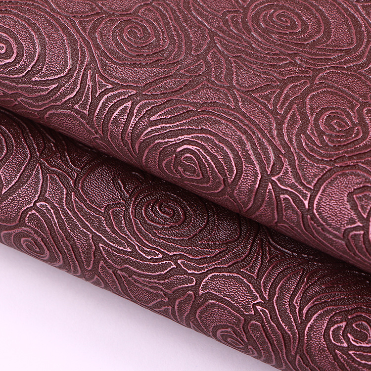 厂家直销 包装皮革人造革压玫瑰花纹不褪色皮料pu电子面料仿皮料