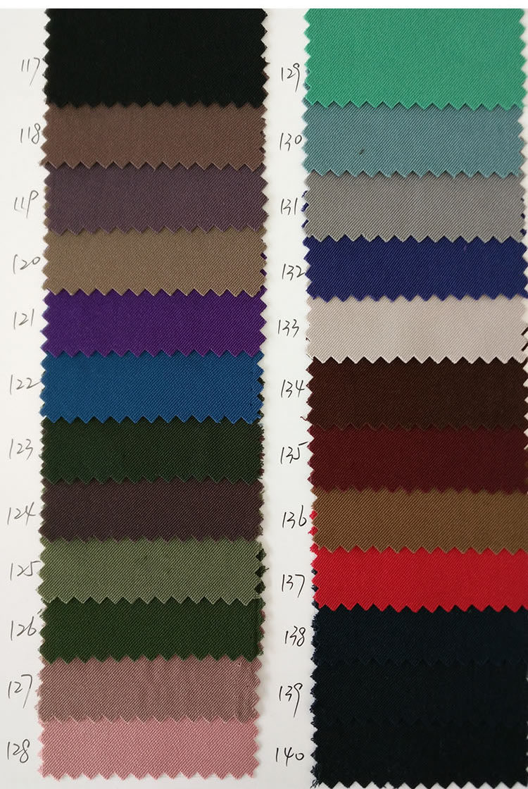 现货供应 涤纶卡丹皇工作服面料 斜纹染色 运动服裤装服装面料