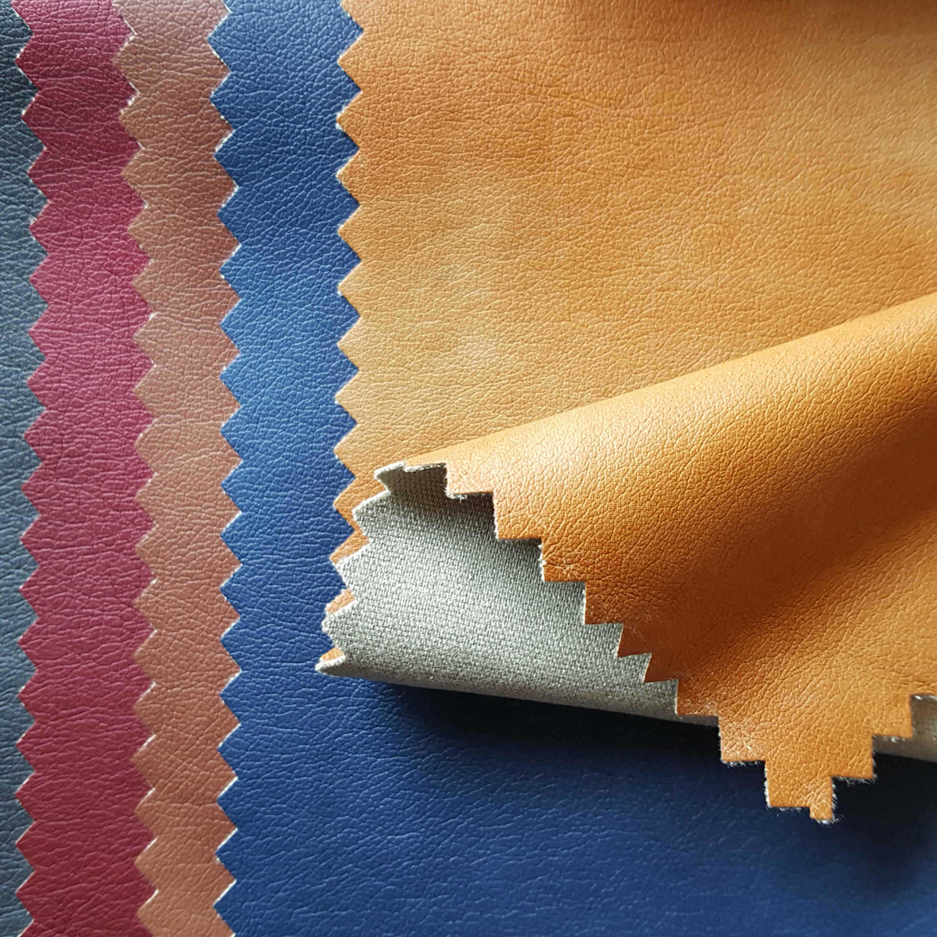 供应pu皮革面料 **服装pu面料 夹克衫pu皮面料 高端.