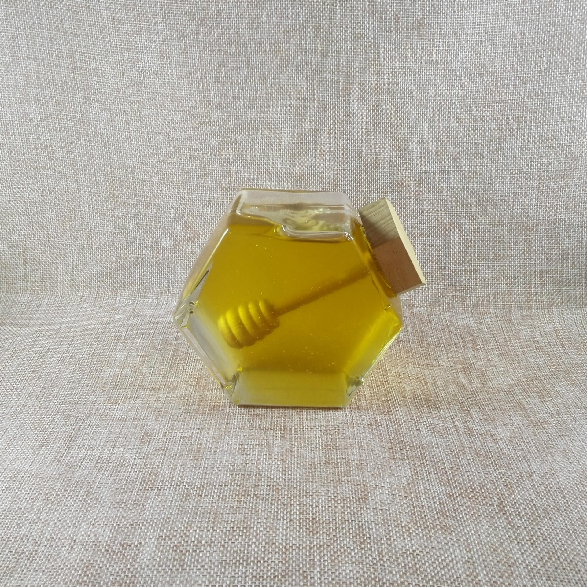 新款六角瓶玻璃蜂蜜瓶 六棱玻璃瓶六角蜂蜜瓶 六角木质盖带沾棒
