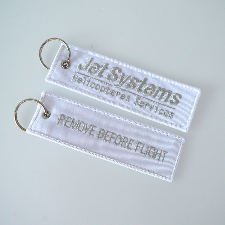 上海厂家批发定做红色帆布刺绣logo锁边钥匙扣布标挂带