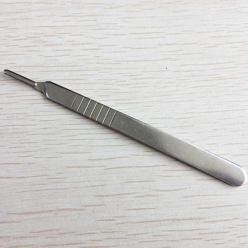 1个15号手术刀片 1个3号刀柄 1包棉签