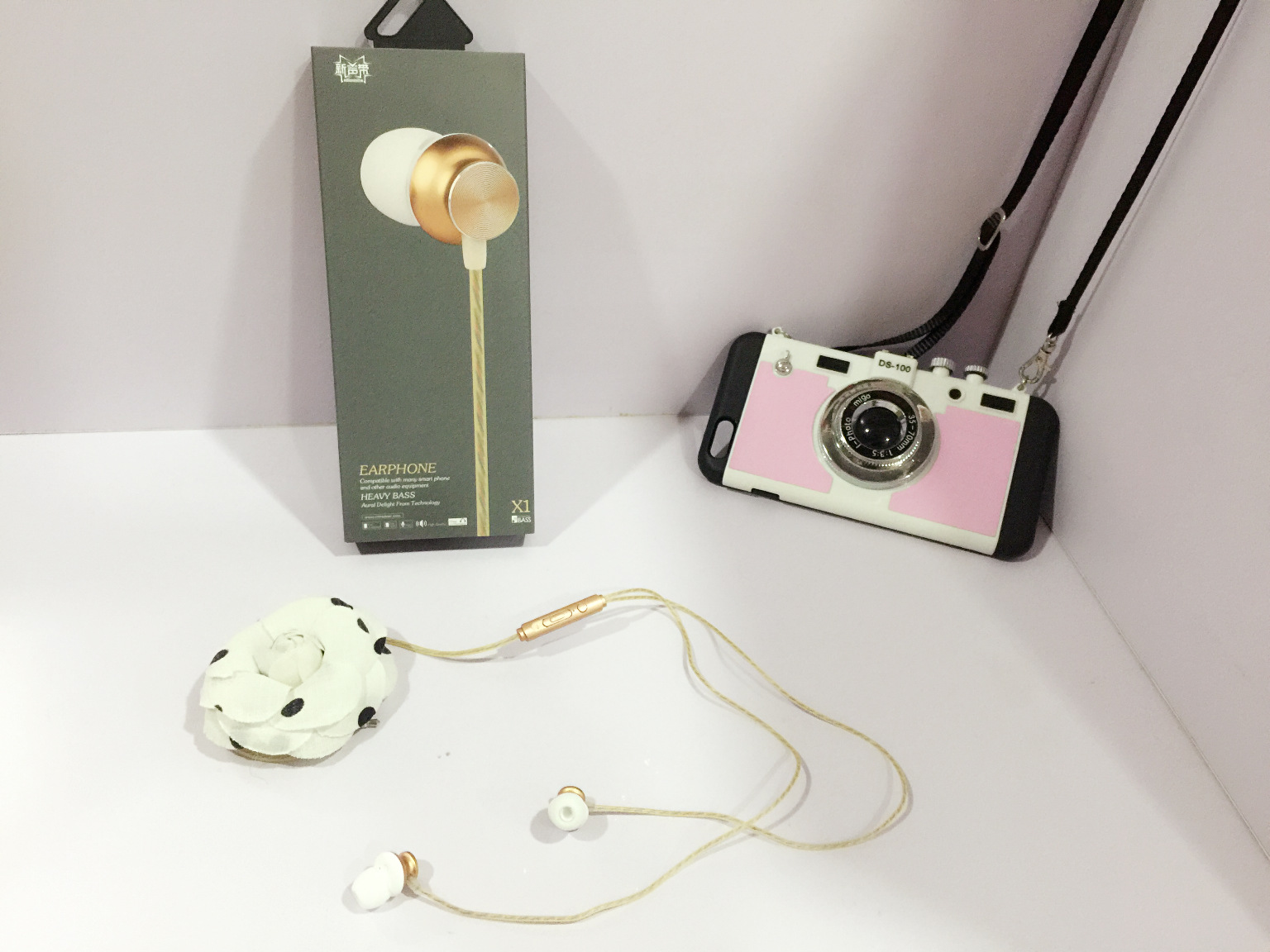 厂家直销新声代2016新款入耳式智能时尚香水耳机x1万能通用