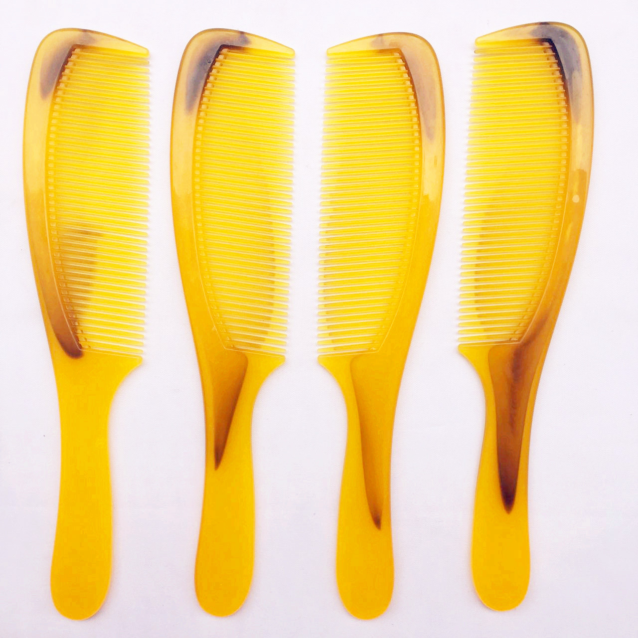 贤玖牌加厚大号牛819折不断保健地摊牛筋梳子批发 牛角梳厂家直销