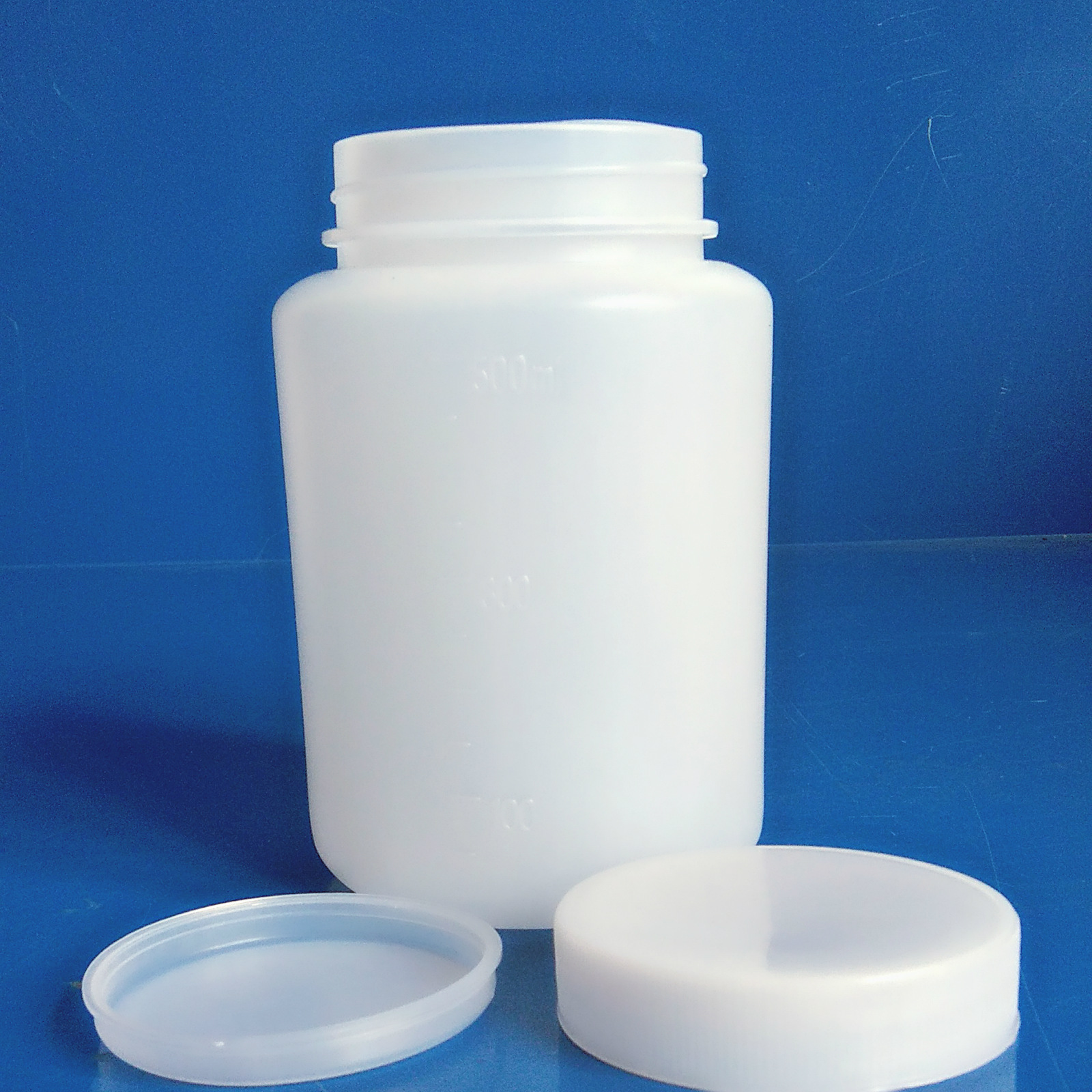 批发500mlpe半透明带内盖刻度瓶 大口塑料瓶 农药瓶 化工瓶