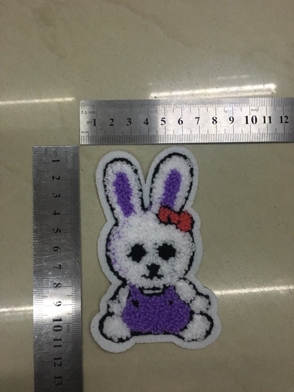 平利电脑绣花,毛巾绣厂家直销,一系列的小公仔平价处理