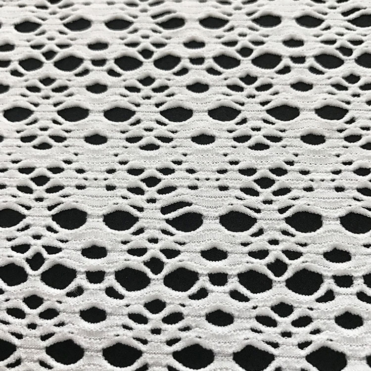 工厂批发蕾丝网布东莞提花镂空面料女装裙针织面料花边