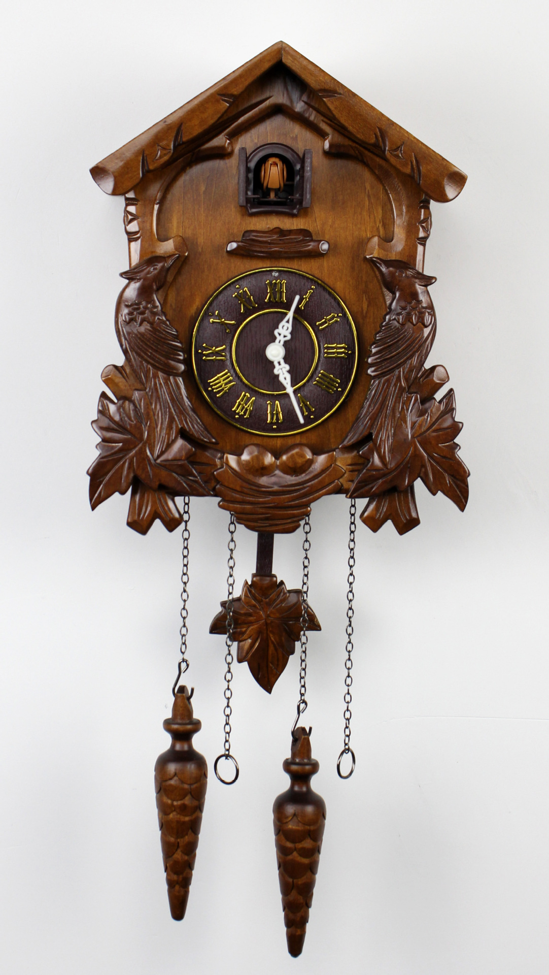 厂家直销咕咕钟椴木制光控报时手工雕刻工艺布谷鸟壁钟欧式创意型