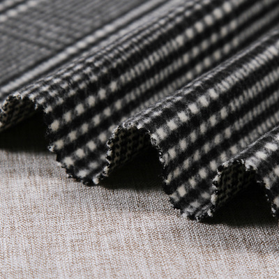 秋冬保暖大衣面料 黑灰色织格子布料 新款大量供应 可批发订制