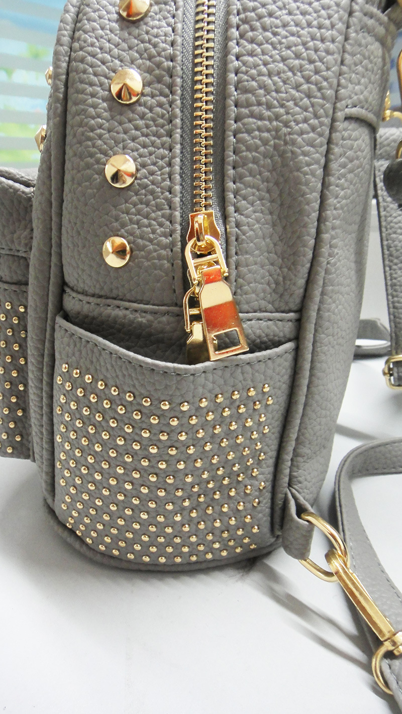 2017韩版时尚女童双肩包pu钉子背包可爱潮范简约多功能女士包包