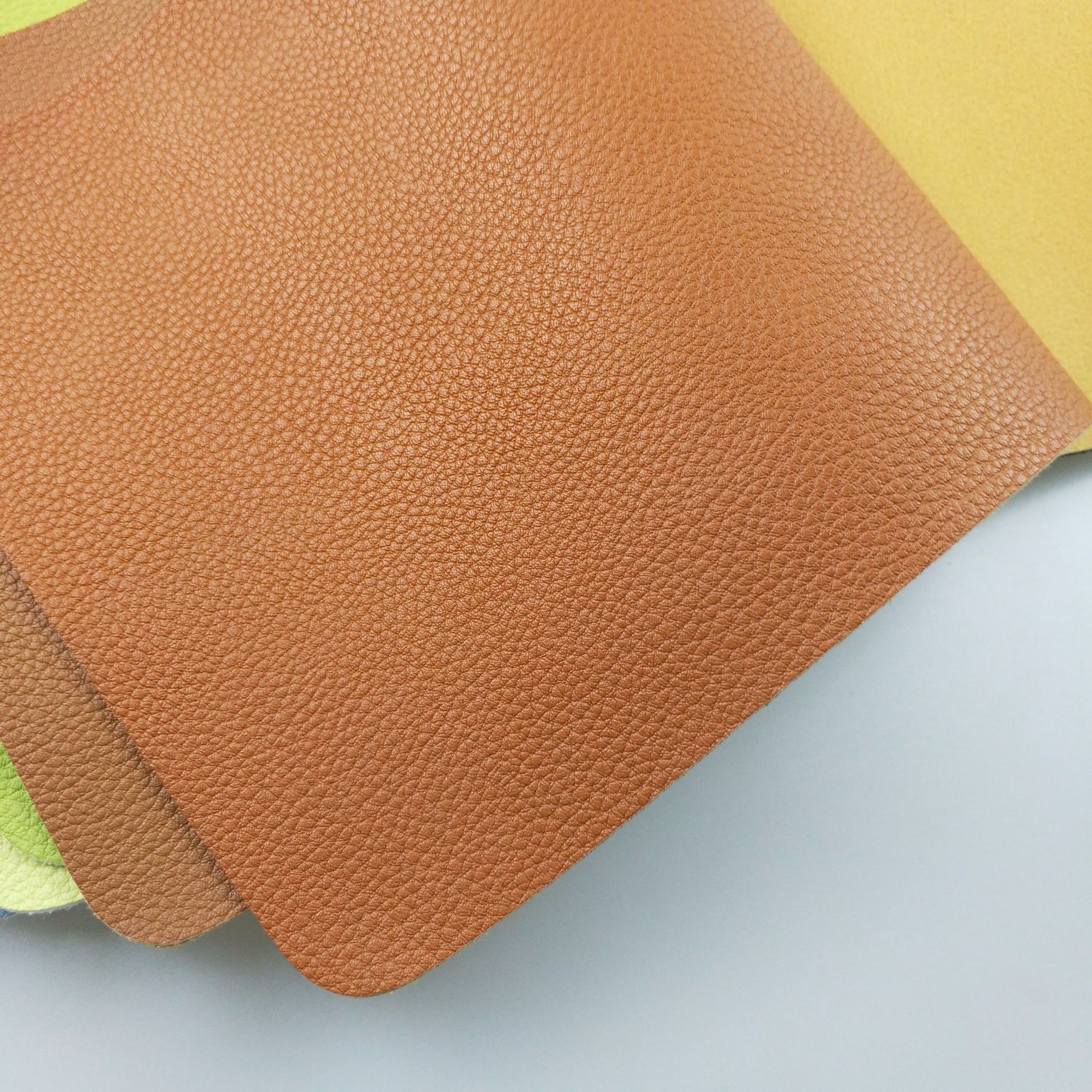 现货供应荔枝纹pu面料 床头软包背景墙装饰材料皮料沙发合成革