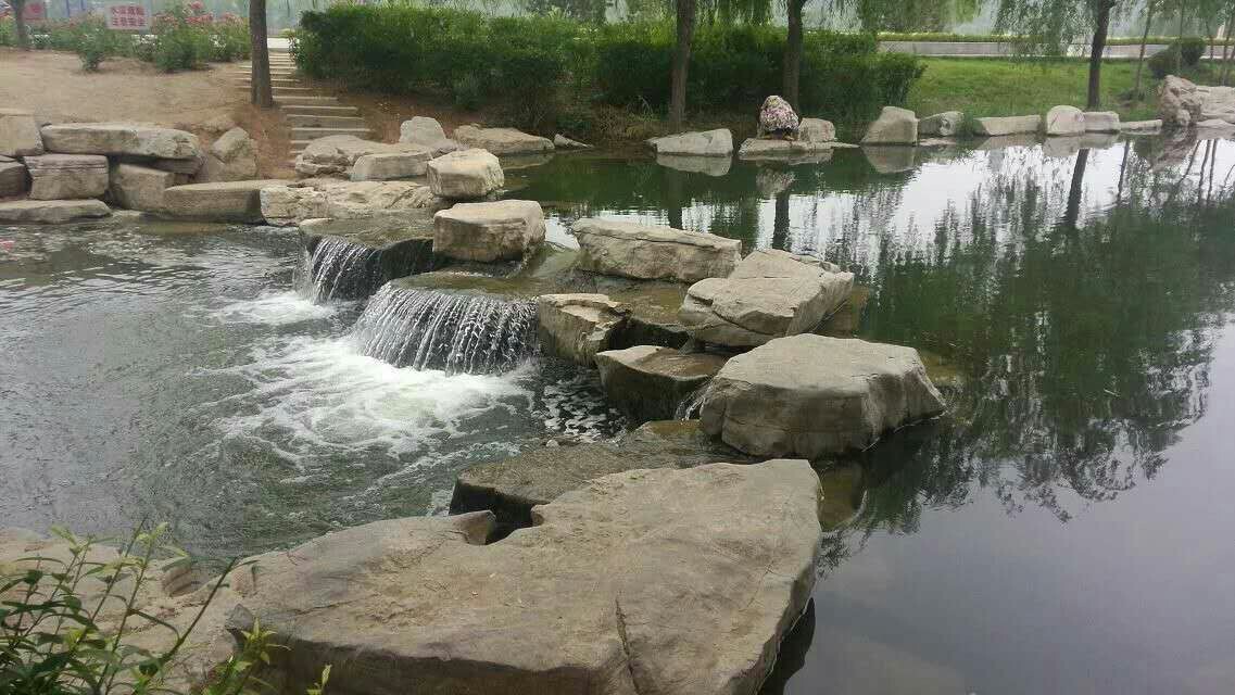 驳岸石产地批发价格低 驳岸工程设计制作 石驳岸 千层石驳岸石