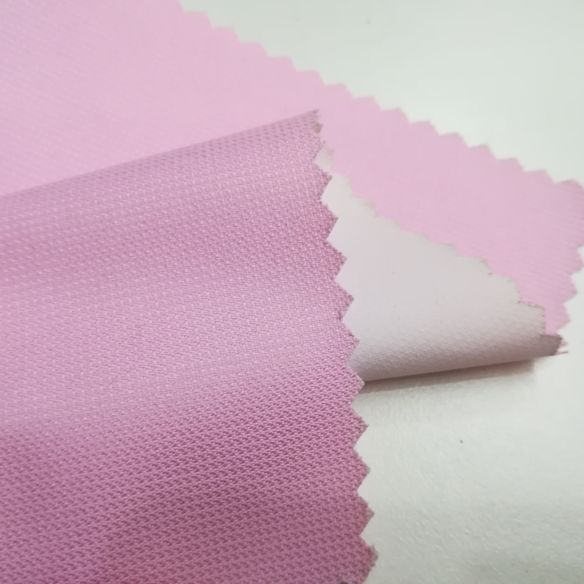 涤纶小蜂巢提花春亚纺防水透气透湿pu白水压户外运动冲锋衣面料