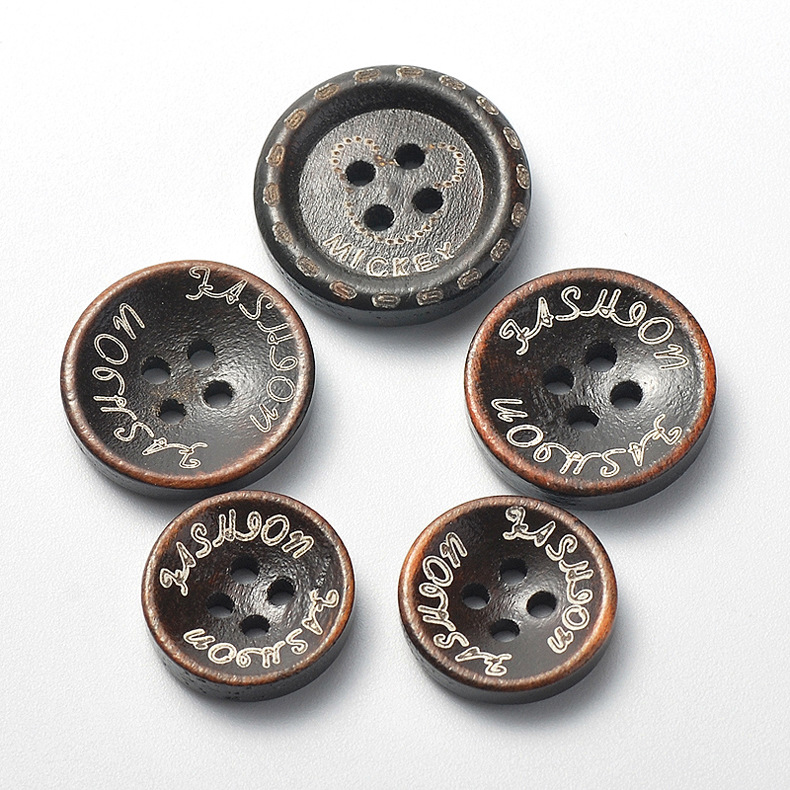 供应优质木质精品纽扣 牛角型胶木有眼纽扣 服装辅料 厂家直销