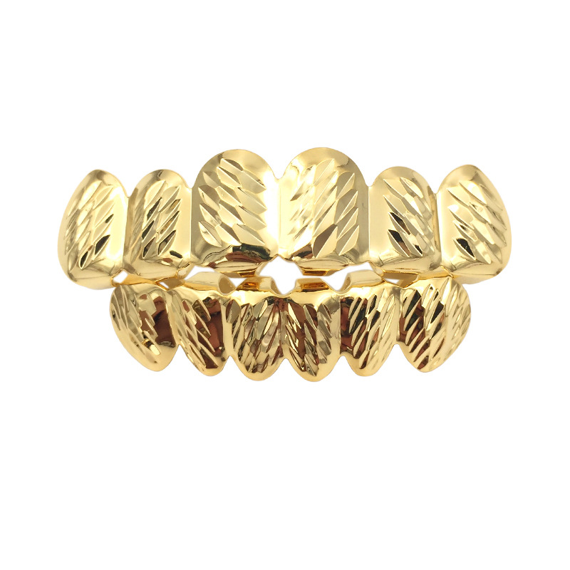 速卖通新款热卖 hiphop嘻哈金牙套披花18k大金牙双色金牙一件代发