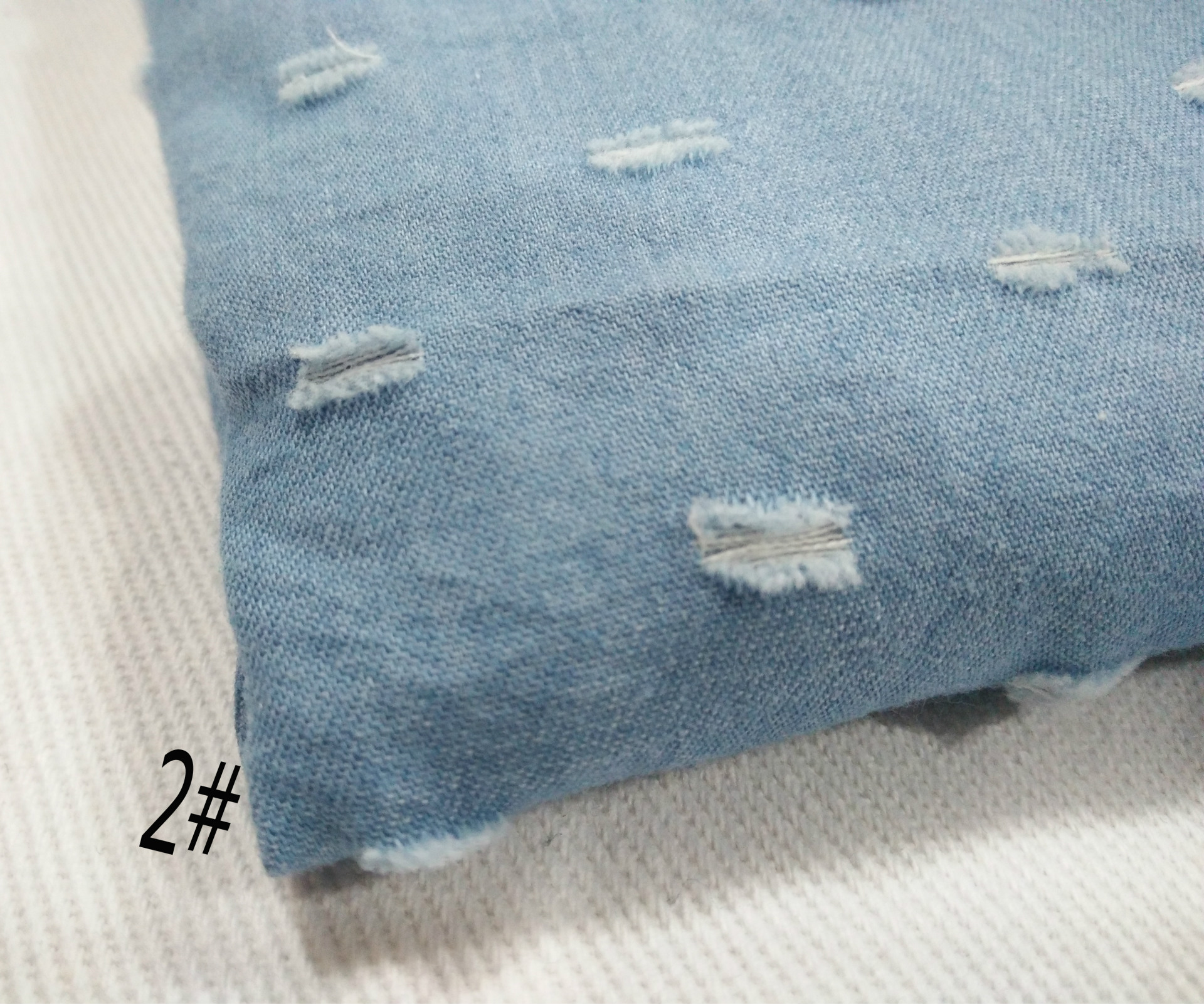 新品冲孔破洞 水洗牛仔面料 服装裤子帽子鞋子箱包用布