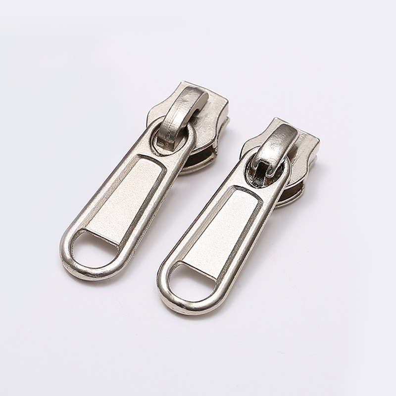 义乌拉链厂 3号尼龙穿孔长板头 3#无锁拉链头 尼龙锌合金象鼻头