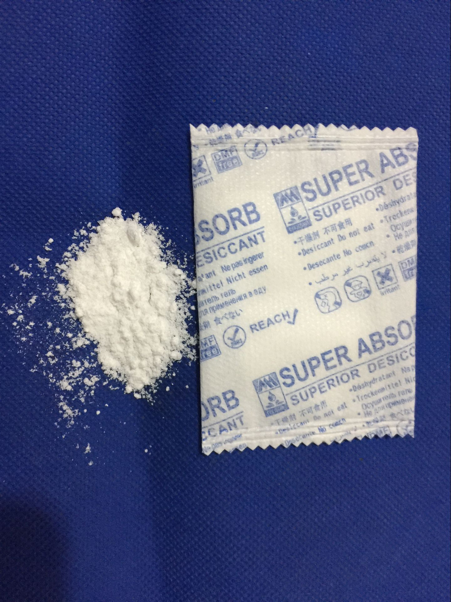 2g双层氯化钙干燥剂 三国语版面氯化钙防潮包 18国特殊版面干燥剂