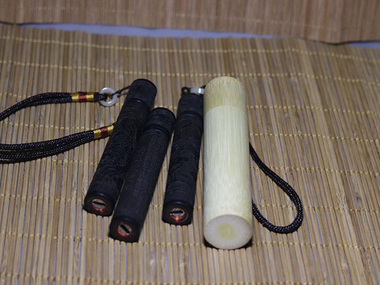 复古黑檀木款火折子雕刻木质打火机防风usb充电吹一吹木质工艺品