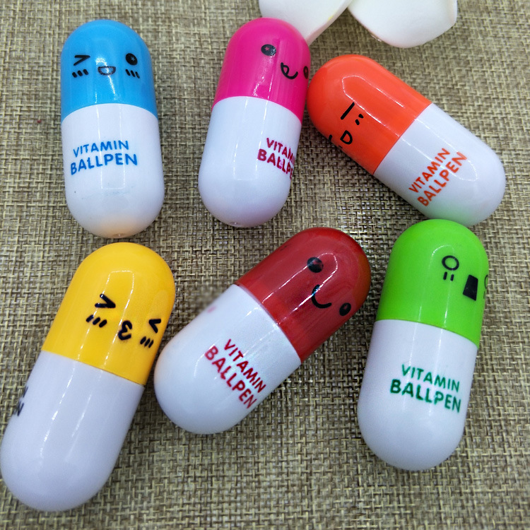 Factory Direct Sales Cute Vitamin Ballpoint Pen Cartoon Expression Retractable Pen Prize Gift Capsule Pen Customized Wholesale