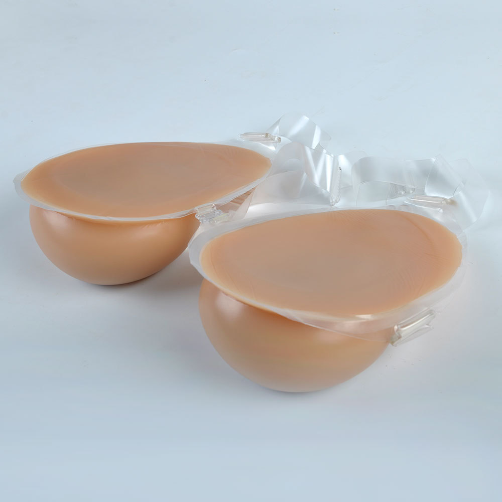 新款水滴型胸前纽扣款连体硅胶假乳房假胸 cd变装伪娘硅胶义乳