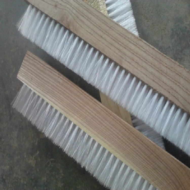 供应各种机械挡尘木质毛刷 铁砂过滤木头防尘白色尼龙耐磨毛刷条