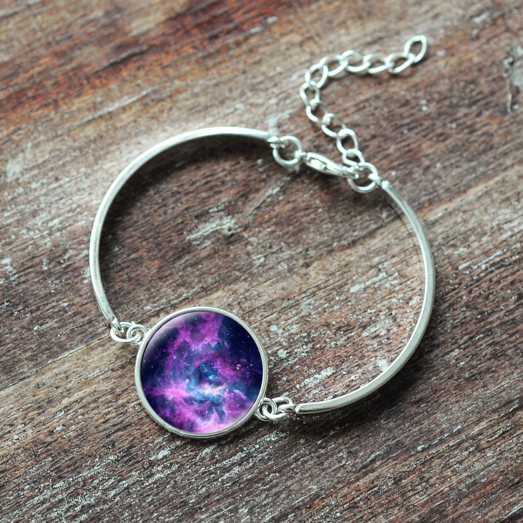 产品名称:星空手链 产品风格:欧美 创意 韩版 商品材质:合金/玻璃 可