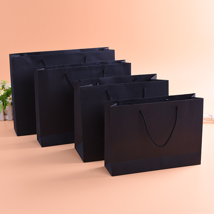 批发 现货加厚手提黄牛皮纸袋 定制服装创意礼品包装袋购物袋定做