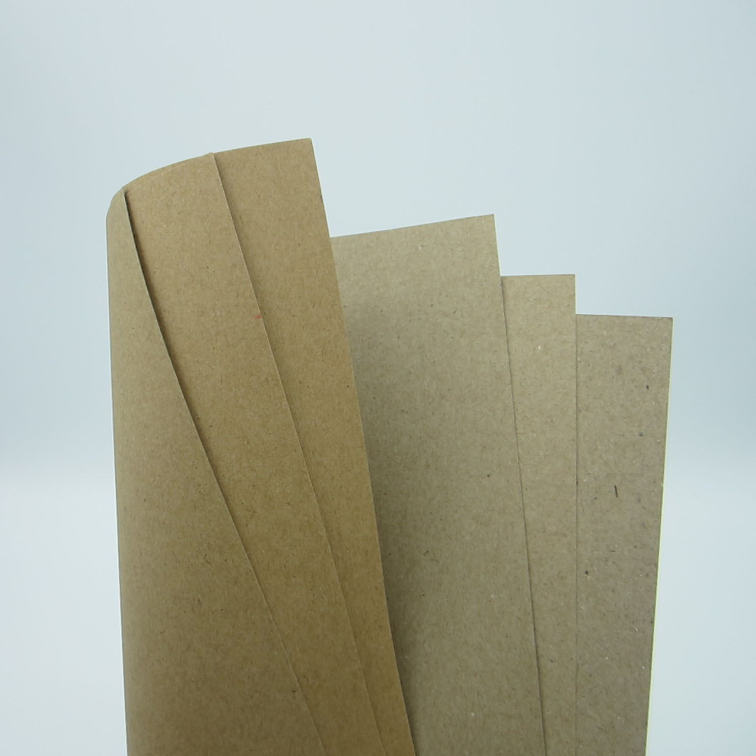 牛皮纸正度126g~250g箱板纸 包装印刷a级单面牛卡纸