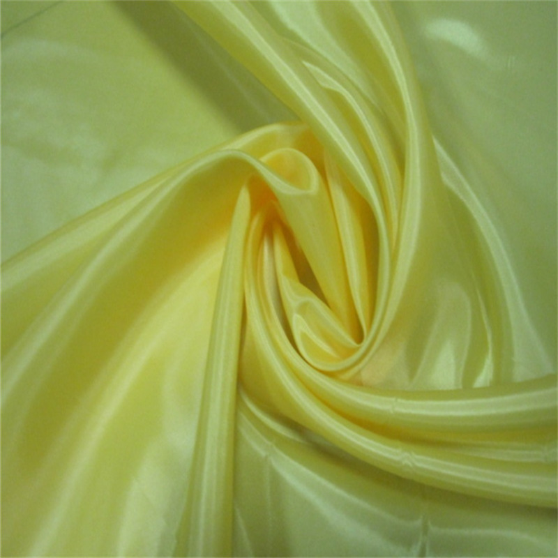 现货 涤丝纺涤塔夫里布 80g西服里子布 服装箱包里料 500色批发