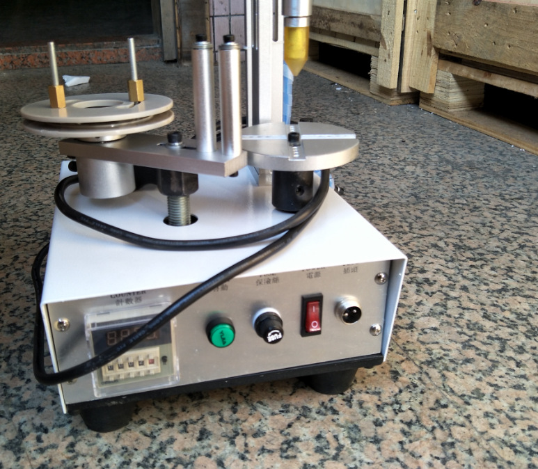 变压器外围胶带包胶机tm-1000高低频变压器外围胶布半自动包胶机