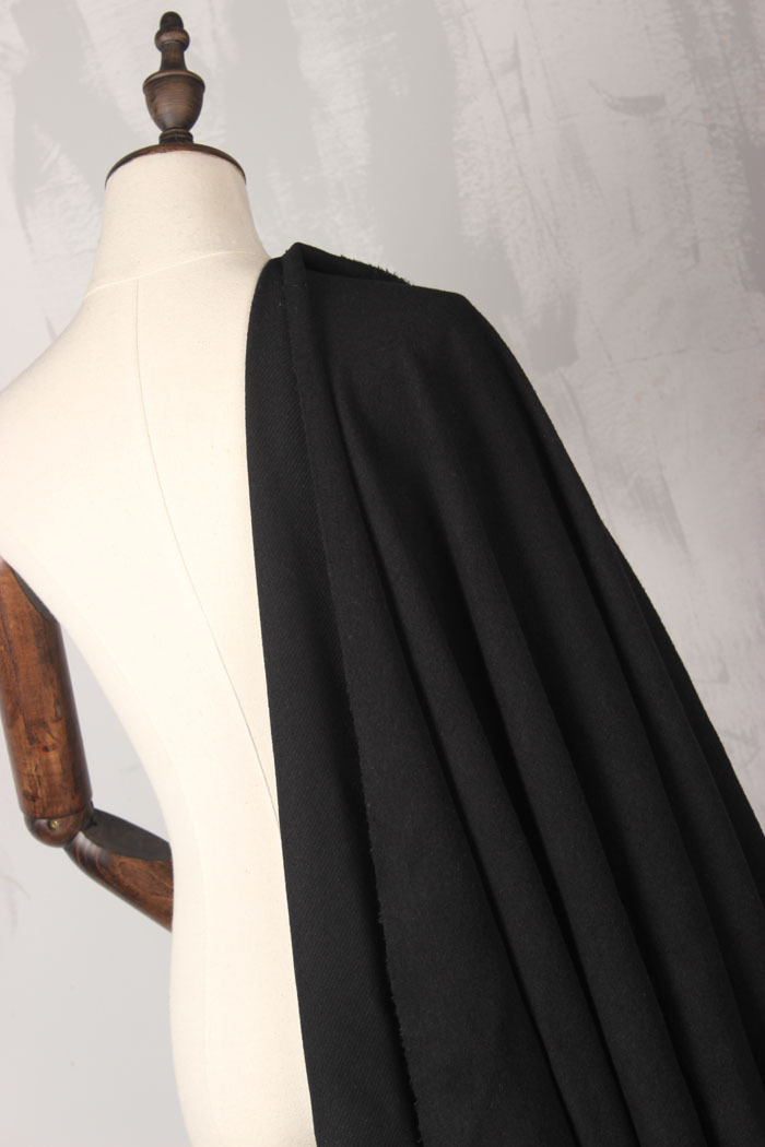 进口余单现货 纯黑色羊毛呢子大衣薄羊毛混纺毛呢面料服装辅料