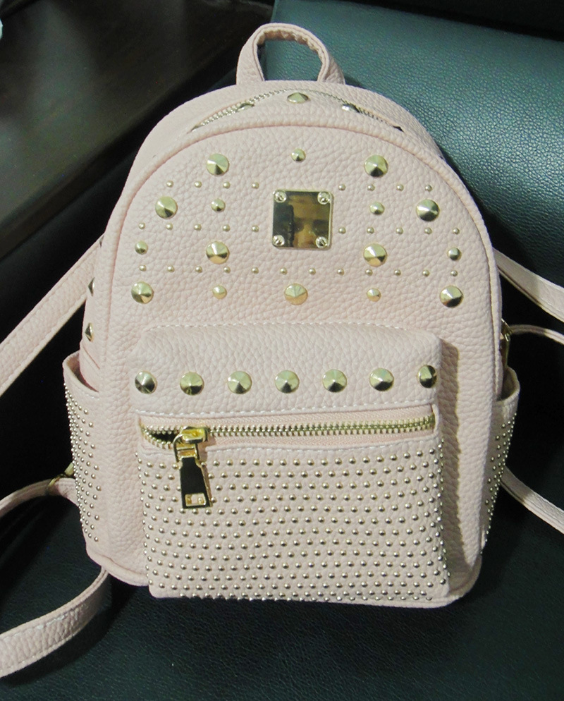 2017韩版时尚女童双肩包pu钉子背包可爱潮范简约多功能女士包包