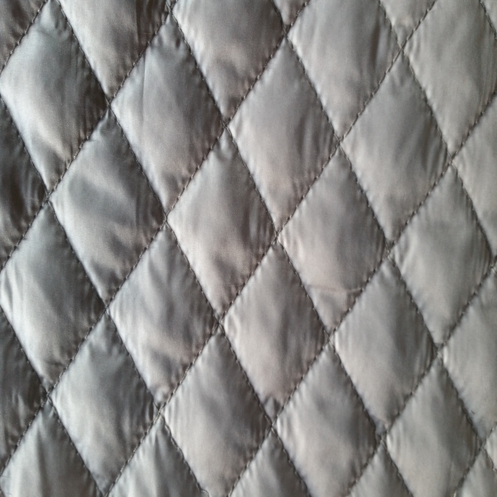 新款热销秋冬绗缝夹棉布 超声波复合无线压棉面料 棉衣里布