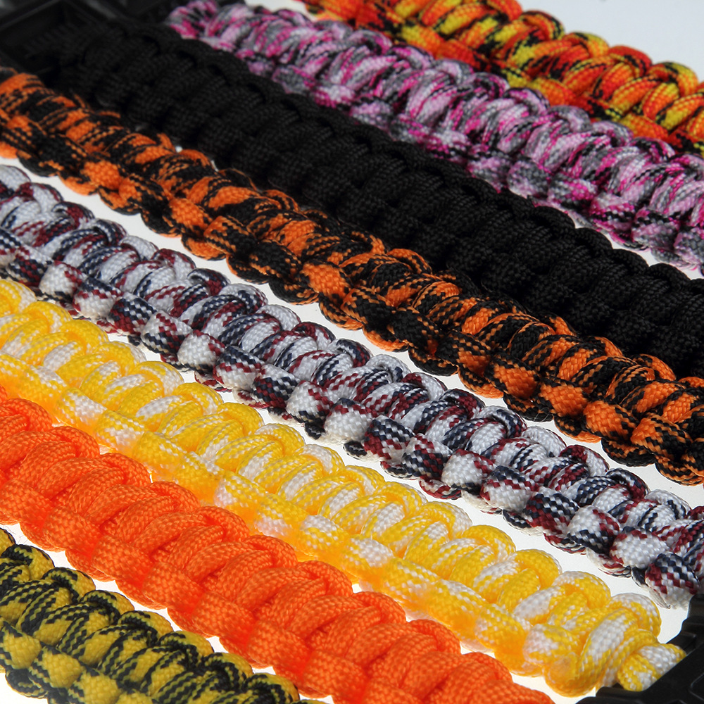 速卖通热销户外运动饰品 个性彩色绳编织塑料扣手链 救生伞绳首饰